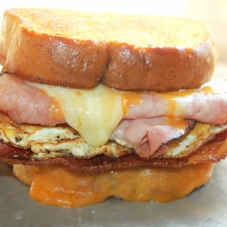 Egg Sandwich with Bacon, Ham or Sausage & Cheese