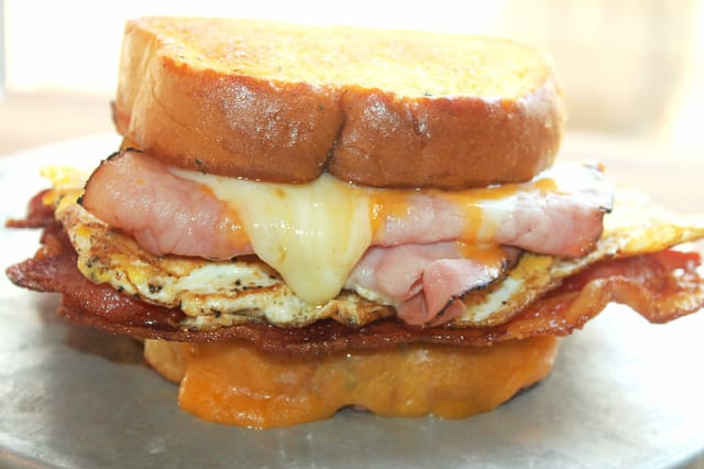 Egg Sandwich with Bacon, Ham or Sausage & Cheese.